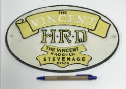 A modern painted cast metal sign "The Vi