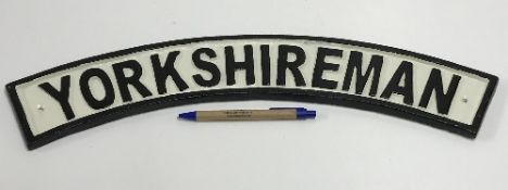 A modern painted cast metal sign "Yorksh