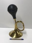 A modern brass taxi style horn