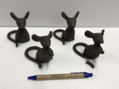 A set of four cast Mouse figures, talles