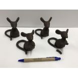 A set of four cast Mouse figures, talles