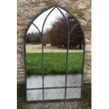 A garden mirror of Gothic arch form, app