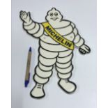 A modern painted cast metal sign "Michelin", approx 35.