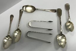 A collection of silver cutlery to include three "Hanoverian" pattern tablespoons,