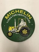 A modern painted cast iron sign inscribed "Michelin Tyres for Agriculture",