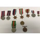 A collection of various medals including a 1914-19 Victory medal awarded to Lieut.