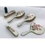 A silver and enamel backed engine-turned dressing table set comprising mirror,