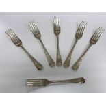 A set of six George III silver table forks bearing initials "JGC" (by William Eley & William Fearn,