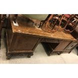 An early 20th Century walnut veneered desk,