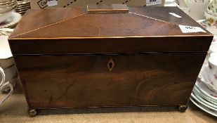 A Regency mahogany and satinwood strung sarcophagus shaped tea caddy,