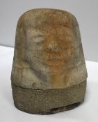 An Egyptian carved stone head in the Ptolomaic style, possibly representing the deity Imsety, 10.