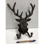 A deer head coat hook,