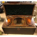 A Regency mahogany two section tea caddy of rectangular form (bowl missing),