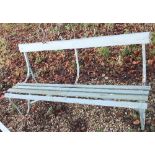 An early 20th Century slatted wood and iron garden bench,