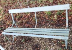 An early 20th Century slatted wood and iron garden bench,
