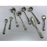 A pair of Victorian Scottish silver "King's" pattern sauce ladles,