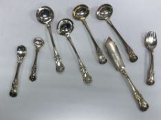 A pair of Victorian Scottish silver "King's" pattern sauce ladles,