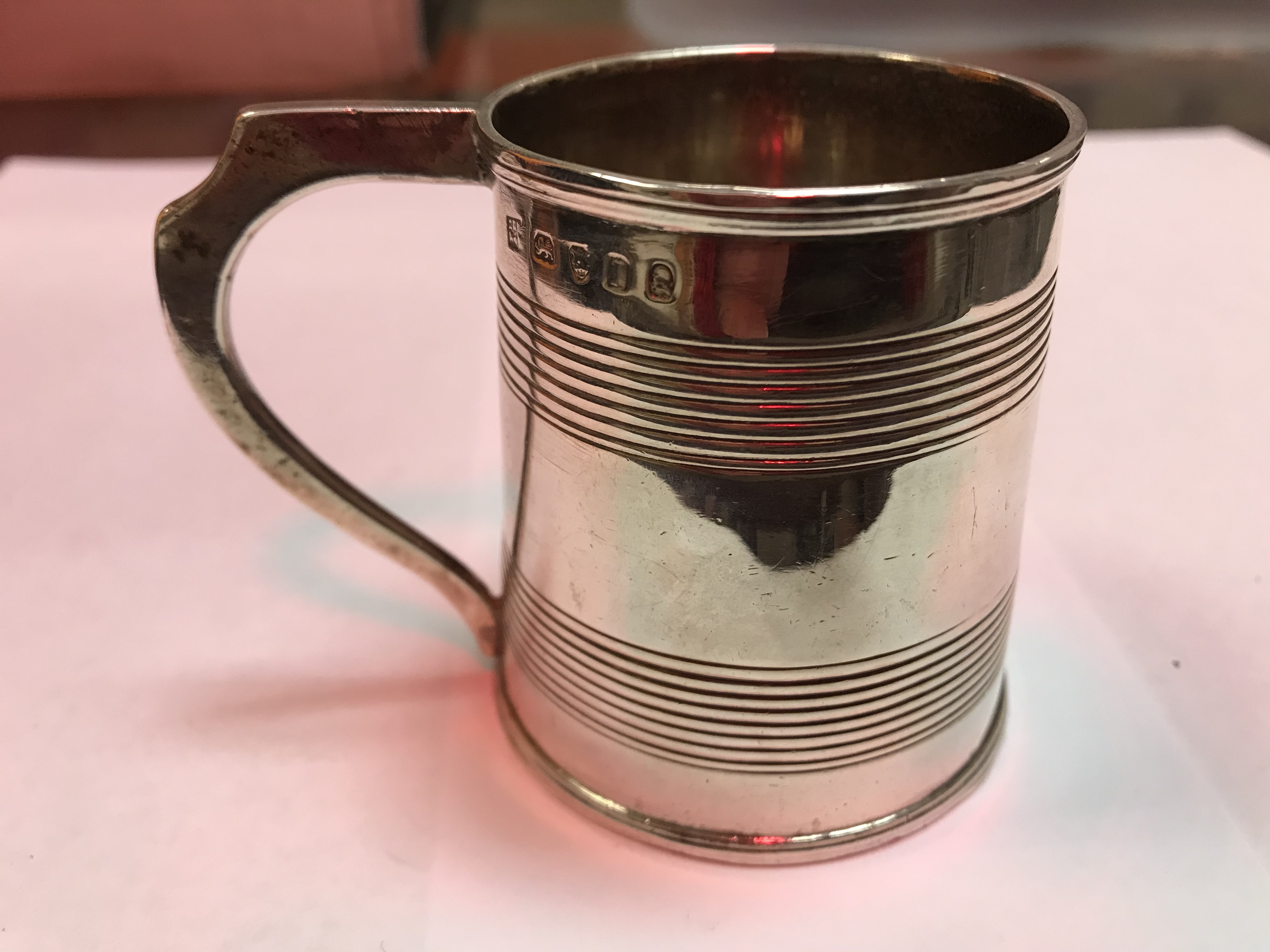 A George II silver baluster shaped mug with later foliate engraved decoration, - Image 32 of 42