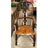 A 19th Century yew wood and elm Nottingham type stick back chair,