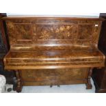A Russell burr walnut cased upright piano with inlaid decoration