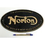 A modern painted cast metal sign "Norton",