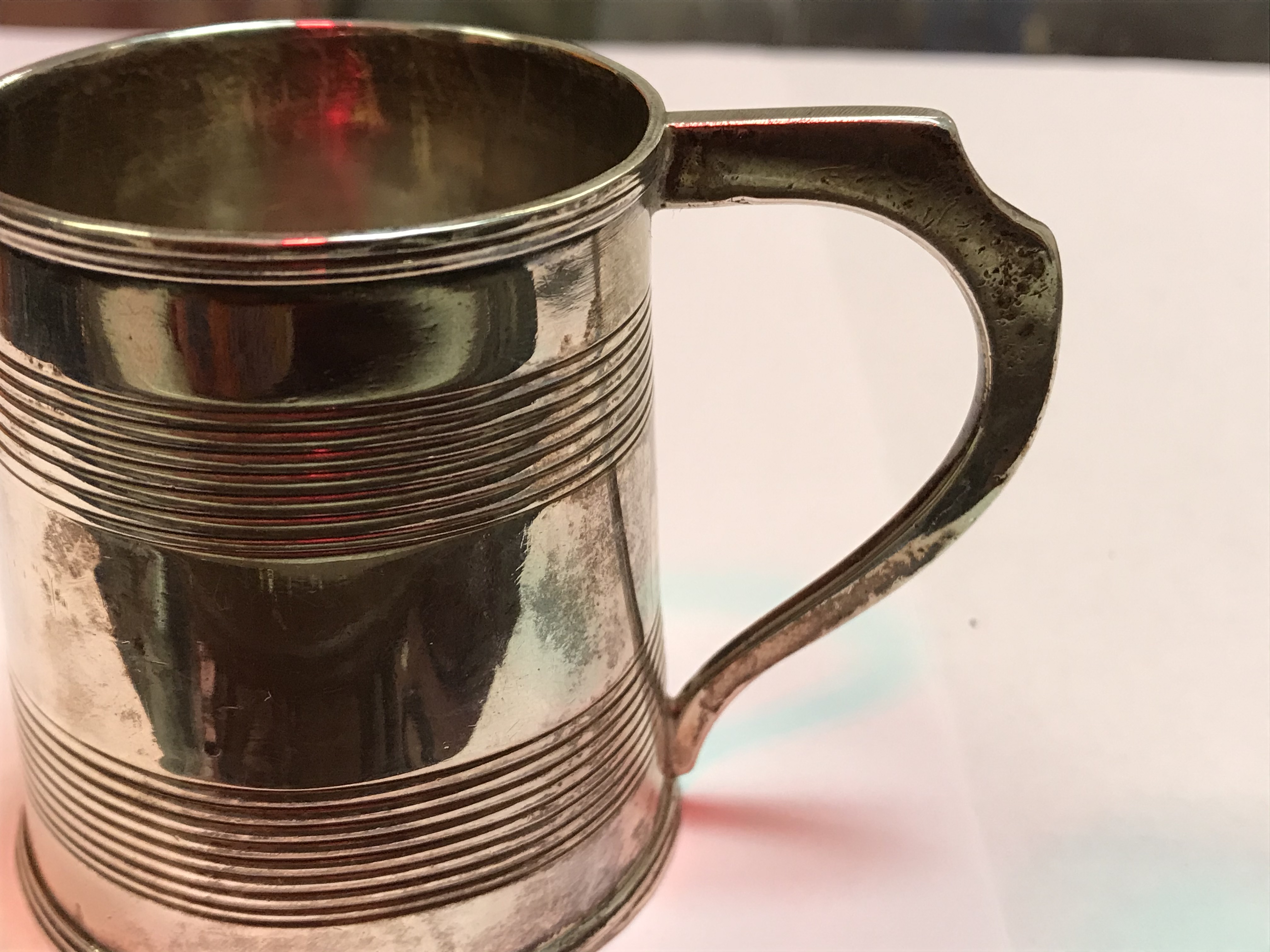 A George II silver baluster shaped mug with later foliate engraved decoration, - Image 36 of 42