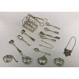 A silver four section toast rack (by Jay, Richard Attenborough Co.