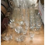 A collection of glassware to include a set of six cut glass conical high ball with engraved