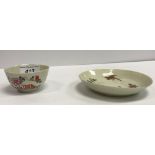 An 18th Century Bow chinoiserie design tea bowl and saucer, tea bowl 7.5 cm diameter, saucer 12.