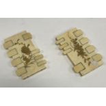 A pair of Japanese Meiji period ivory and gilt decorated bezique markers,