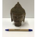 A modern bronze Thai Buddha head bearing character mark to base,