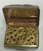 An early Victorian silver vinaigrette of rectangular form with engine-turned decoration,