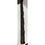 An 17th Century carved oak pilaster depicting a musician, Hercules with club and lion,