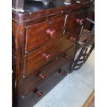 A Victorian pine chest of drawers, the plain top above two short and three long drawers,