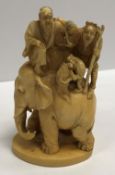 A 19th Century Japanese Meiji period carved ivory okimono as figures,