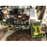 Three vintage dolls' houses,