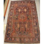 A Kashan rug,