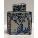 A 19th Century Delft ware tea caddy set with windmills, bearing "VR" mark to base, 11.