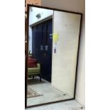 A 20th Century mahogany framed rectangular wall mirror with plain plate 119 cm x 195 cm