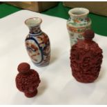 Two cinnabar lacquer type decorated scent bottles,