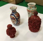 Two cinnabar lacquer type decorated scent bottles,