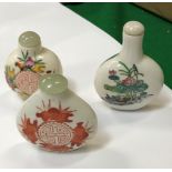 A collection of eleven Oriental porcelain snuff / scent bottles,
