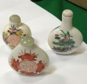 A collection of eleven Oriental porcelain snuff / scent bottles,