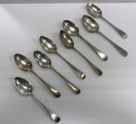 A collection of five various silver "Old English" pattern tablespoons (by Peter,