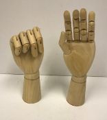 Two modern artist's wooden model hands