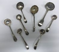 A collection of eight various 19th Century silver sifter spoons, various designs, dates and makers,