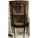 A 19th Century rosewood veneered display cabinet of demilune form,