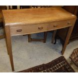 An Arts & Crafts style side table, the plain top above two drawers,