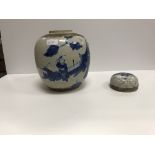 Two large Chinese blue and white decorated ginger jars decorated with figures in a garden setting,