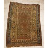 An Afshar rug, the central panel set with repeating geometric pattern on a red ground,